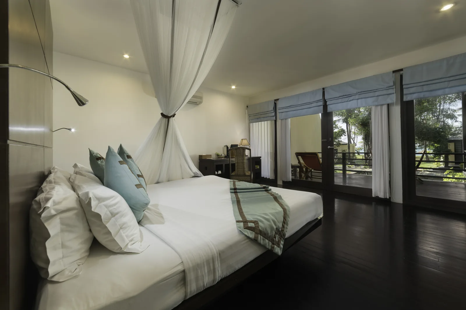 Representative hotel room with balcony and work desk