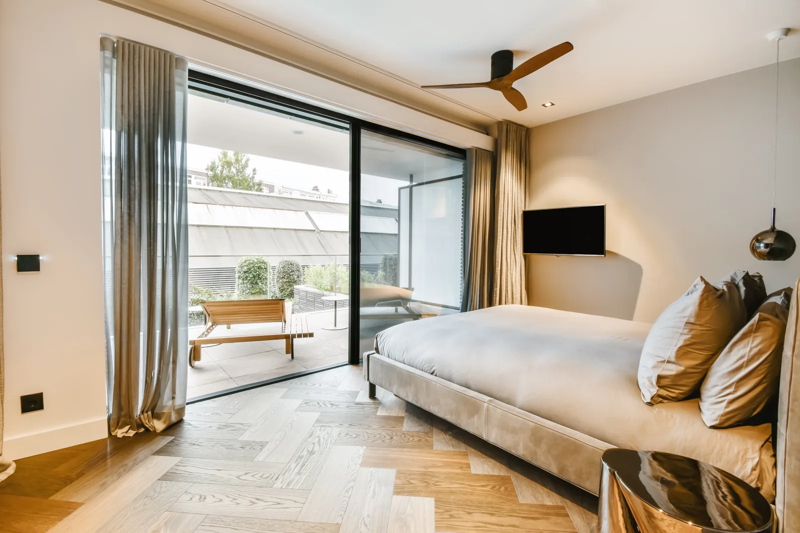 Representative hotel bedroom with balcony